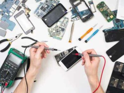 cell-phone-repair-service-center-smartphone-disassembling-diagnostics-repairman-workplace-top-view_116547-11112-1